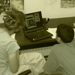 Mentor Ali helps youth edit video